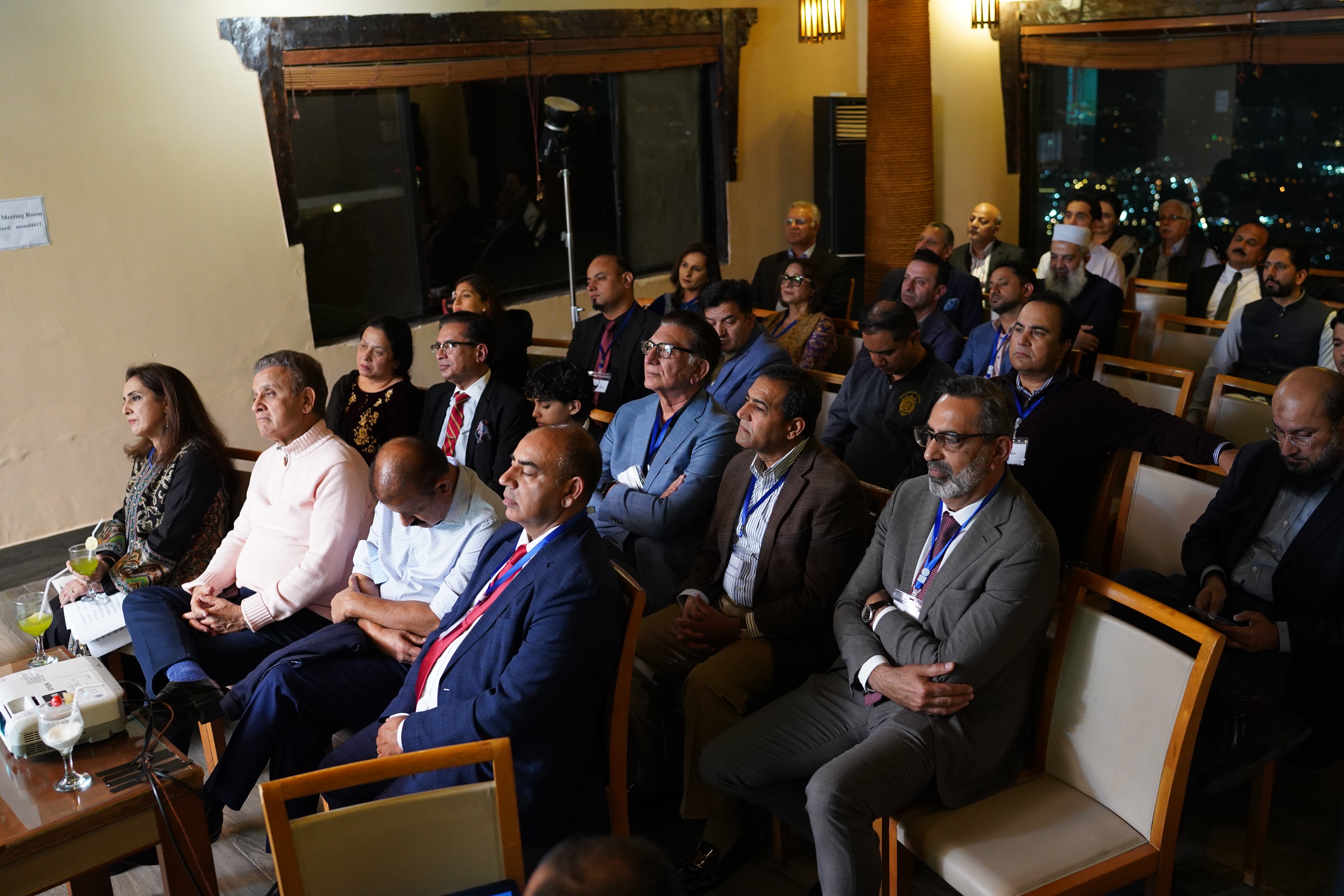 Awardees networking with Vice Chancellor, Dr. Arshad Ahmad over welcome drinks